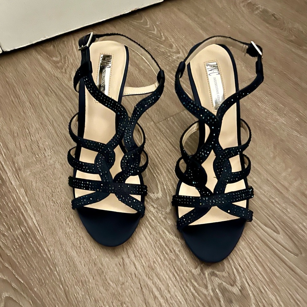 Navy blue INC size 8M high heels.